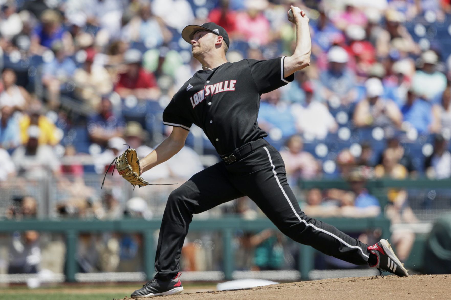 Louisville starting pitcher Reid Detmers delivers against Vanderbilt